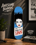 It's Friday I'm in Love decorative skateboard deck with blue pop art design, black dots and illustrated portrait
