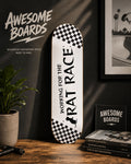 Working for the Rat Race decorative skateboard deck with black and white checkerboard artwork